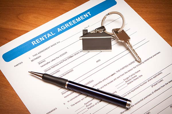 Rental agreement, pen and key