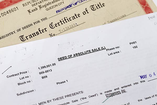 Transfer certificate of title and deed of absolute sale